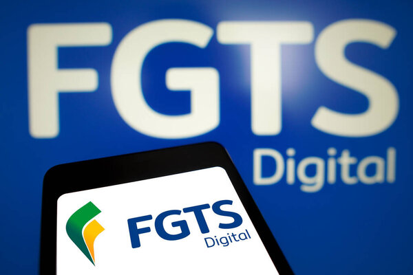 March 4, 2024, Brazil. In this photo illustration, the FGTS Digital logo is displayed on a smartphone screen and in the background
