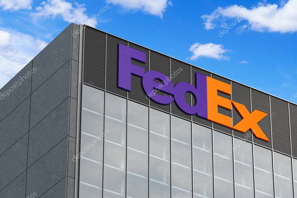 April 6, 2024, Brazil. In this photo illustration in 3D the FedEx Corporation logo seen on top of the glass building