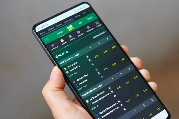 stock image April 12, 2024, Brazil. In this photo illustration, the the Bet365 sports betting platform is seen on a smartphone screen. Several cities around the world are in the process of legalizing sports betting