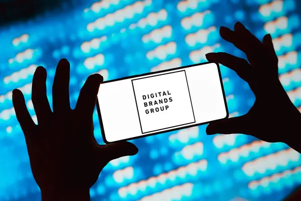 stock image May 20, 2024, Brazil. In this photo illustration, the Digital Brands Group (DBG) logo is displayed on a smartphone screen