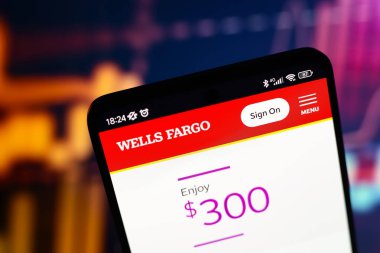 July 8, 2024, Paraguay. In this photo illustration, the Wells Fargo logo is displayed on the website on the smartphone screen clipart