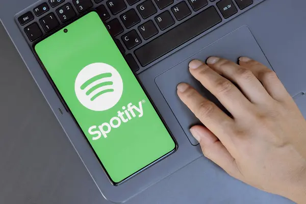 stock image July 23, 2024, Paraguay. In this photo illustration, the Spotify logo is displayed on a smartphone screen