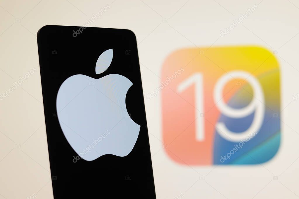 August 1, 2024, Paraguay. In this photo illustration, the Apple logo seen displayed on a smartphone with an iOS 19 logo in the background