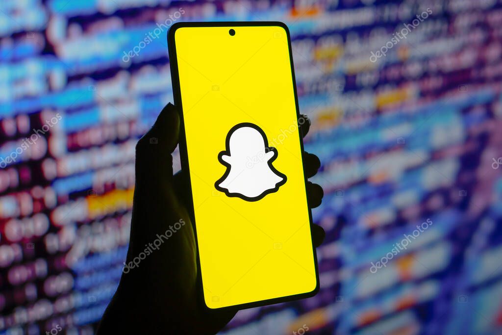 August 4, 2024, Paraguay. In this photo illustration, the Snapchat logo is displayed on a smartphone screen