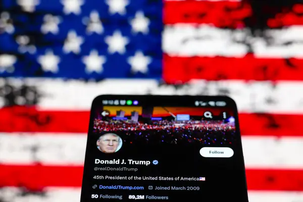 stock image August 13, 2024, Paraguay. In this photo illustration, former United States President Donald Trump official X (Twitter) profile is seen displayed on a smartphone. Trump returned to social media after a three-and-a-half-year break