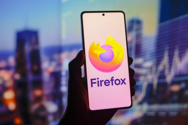 August 15, 2024, Paraguay. In this photo illustration, the from the Mozilla Firefox web browser logo is displayed on a smartphone screen clipart