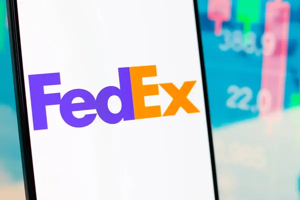 stock image August 19, 2024, Paraguay. In this photo illustration, the FedEx Corporation logo is displayed on a smartphone screen