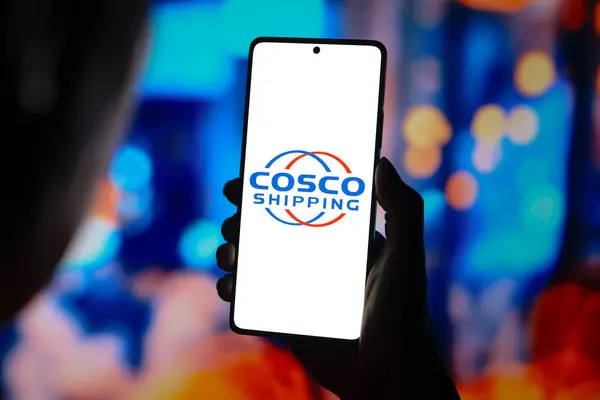 stock image August 24, 2024, Paraguay. In this photo illustration, the COSCO Shipping logo is displayed on a smartphone screen