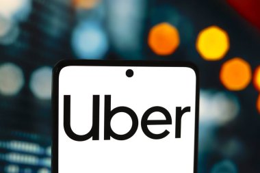 25 Ağustos 2024, Paraguay. Bu fotoğraf illüstrasyonunda, Uber Technologies Inc. logosu akıllı telefon ekranında görüntülenir