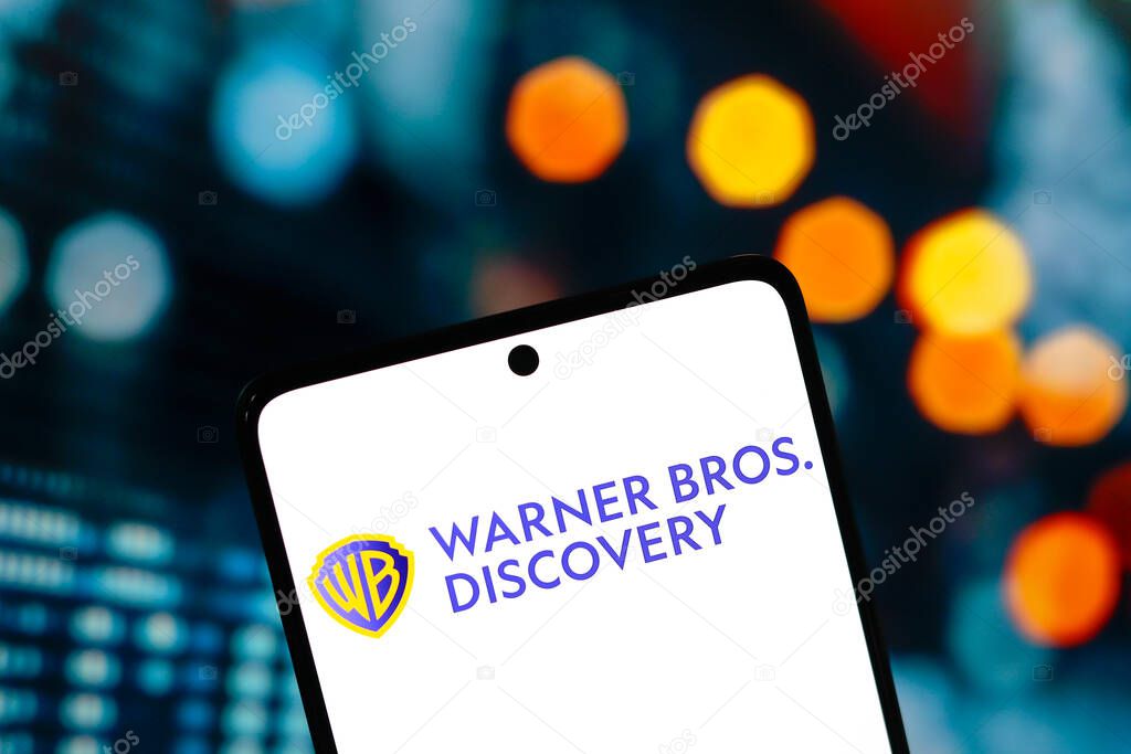 August 25, 2024, Paraguay. In this photo illustration, the Warner Bros. Discovery, Inc. logo is displayed on a smartphone screen