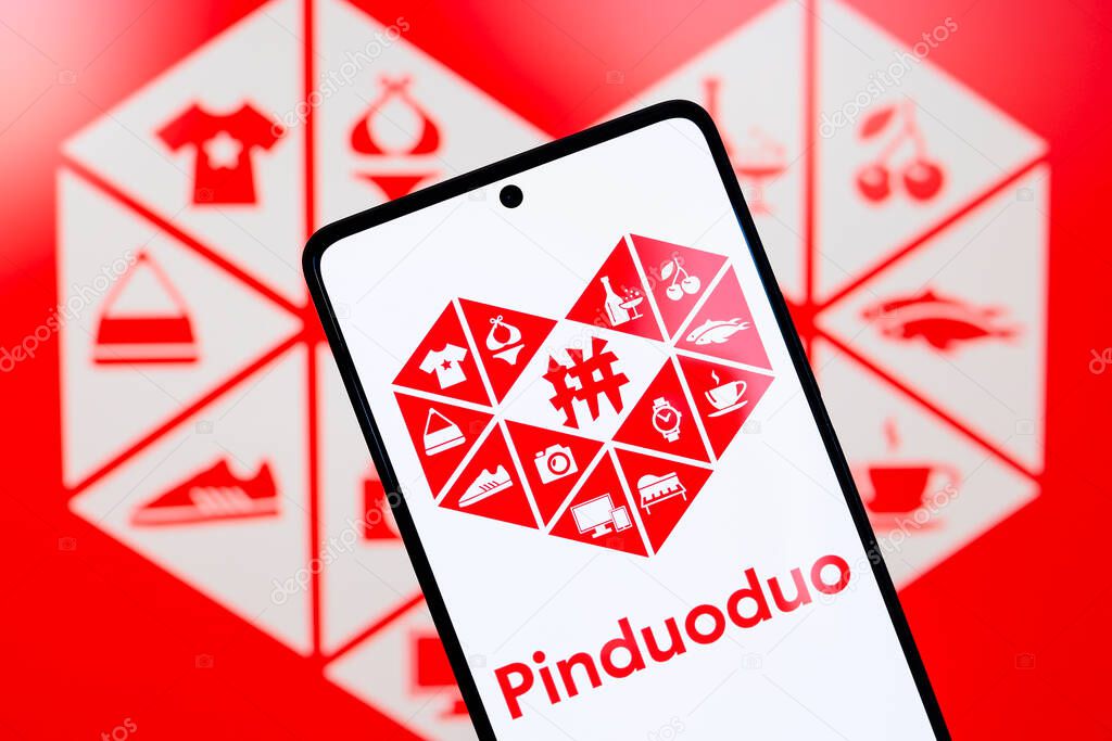 August 26, 2024, Paraguay. In this photo illustration, the Pinduoduo (PDD Holdings) logo is displayed on a smartphone and in the background
