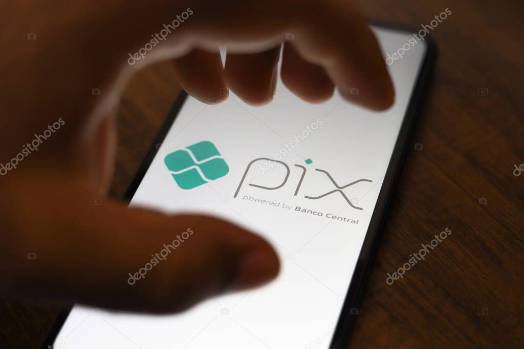 October 14, 2024, Brazil. The Pix logo is displayed on a smartphone screen. Is a mode of instant money transfer and instant electronic payment in Brazilian real