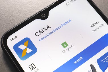 22 Ekim 2024, Brezilya. Bu resimde, Caixa the Federal uygulama logosu akıllı telefon ekranında gösterilir..