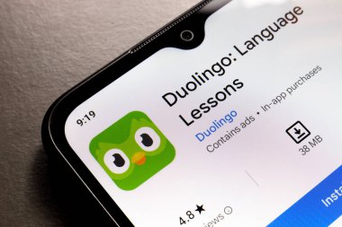 October 25, 2024, Brazil. In this photo illustration, the Duolingo app logo is displayed on a smartphone screen clipart