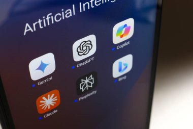 The Google Gemini, ChatGPT, Microsoft Copilot, Claude by Anthropic, Perplexity and Bing apps logos is displayed on the screen of a smartphone, in Reno, United States, on November 21, 2024 clipart