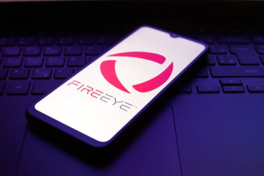 FireEye, Inc. logosu 1 Aralık 2024 'te Reno, ABD' de bir akıllı telefonun ekranında göründü..