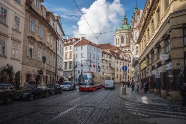 Prague, Czechia - Sep 26, 2019: Mala Strana Streets with St. Nicholas Church - Prague, Czech Republic