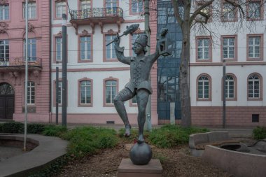 Mainz, Germany - Jan 22, 2020: Jester with lantern (Bajazz mit Laterne) Sculpture at Schillerplatz Square - Mainz, Germany