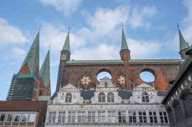 Lubeck Town Hall Renaissance Arbor and Gothic Shield Wall with St. Mary Church (Marienkirche) Tower - Lubeck, Germany