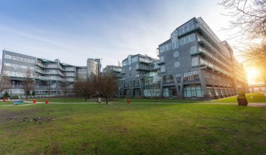 Hamburg, Germany - Jan 11, 2020: Michelwiese Park and Gruner + Jahr Publishing House Modern Building Headquarters - Hamburg, Germany