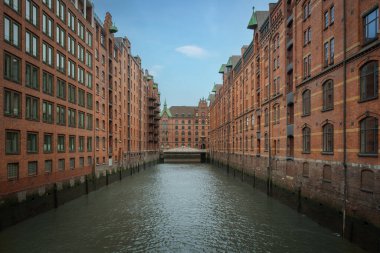 Brick Buildings and Canal at Speicherstadt warehouse district - Hamburg, Germany