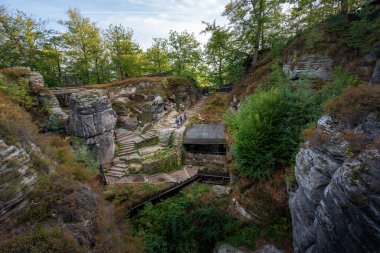 Rathen, Germany - Sep 19, 2019: Stone formations and ruins of Neurathen Castle near Bastei Bridge (Basteibrucke) - Saxony, Germany
