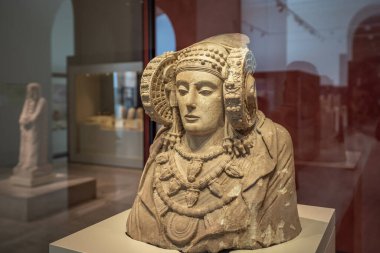 Madrid, Spain - Jun 18, 2019: Lady of Elche (La Dama de Elche) Iberian Sculpture at National Archaeological Museum - Madrid, Spain clipart