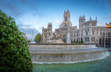 Fountain of Cybele and Cibeles Palace at Plaza de Cibeles - Madrid, Spain clipart