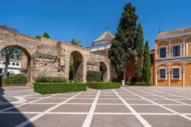 Seville, Spain - Apr 3, 2019: Monteria Courtyard (Patio de la Monteria) at Alcazar (Royal Palace of Seville) - Seville, Andalusia, Spain clipart
