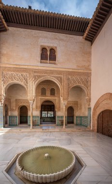Granada, Spain - Jun 5,  2019: Gilded Room Courtyard (Patio del Cuarto Dorado) at Nasrid Palaces of Alhambra - Granada, Andalusia, Spain clipart