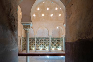 Granada, Spain - Jun 5,  2019: Comares Baths at Nasrid Palaces of Alhambra - Granada, Andalusia, Spain clipart