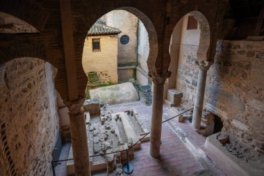 Toledo, Spain - Mar 27, 2019: Arches of former Mosque at El Salvador Church Interior - Toledo, Spain clipart