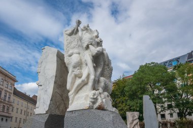 Vienna, Austria - Oct 10, 2019: Gate of Violence Sculpture part of the Memorial against war and fascism by Alfred Hrdlicka at Albertinaplatz - Vienna, Austria clipart