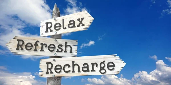 Relax, refresh, recharge - wooden signpost with three arrows