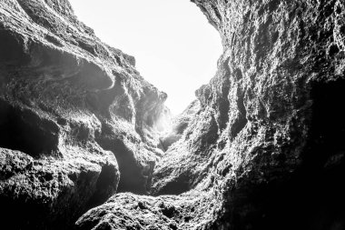 Rocks and sky in Raudfeldsgja Cave on Snaefellsnes Peninsula in Iceland