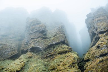 Rocks and fog at Raudfeldsgja Gorge on Snaefellsnes Peninsula in Iceland