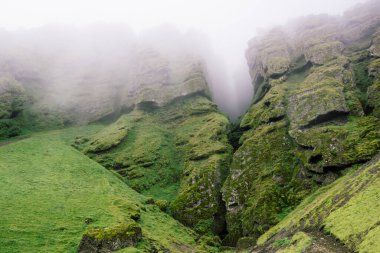 Rocks and fog at Raudfeldsgja Gorge on Snaefellsnes Peninsula in Iceland
