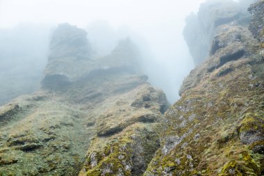 Rocks and fog at Raudfeldsgja Gorge on Snaefellsnes Peninsula in Iceland
