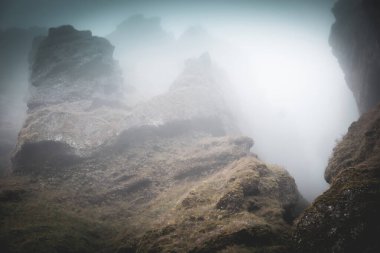 Rocks and fog at Raudfeldsgja Gorge on Snaefellsnes Peninsula in Iceland