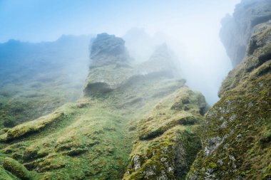 Rocks and fog at Raudfeldsgja Gorge on Snaefellsnes Peninsula in Iceland