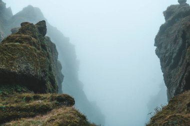 Rocks and fog at Raudfeldsgja Gorge on Snaefellsnes Peninsula in Iceland