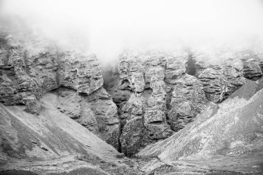 Rocks and fog at Raudfeldsgja Gorge on Snaefellsnes Peninsula in Iceland