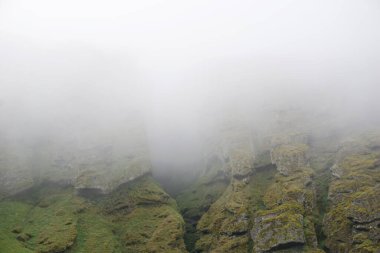 Rocks and fog at Raudfeldsgja Gorge on Snaefellsnes Peninsula in Iceland