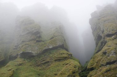 Rocks and fog at Raudfeldsgja Gorge on Snaefellsnes Peninsula in Iceland