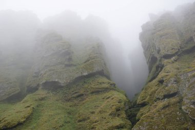 Rocks and fog at Raudfeldsgja Gorge on Snaefellsnes Peninsula in Iceland