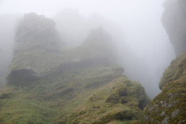 Rocks and fog at Raudfeldsgja Gorge on Snaefellsnes Peninsula in Iceland