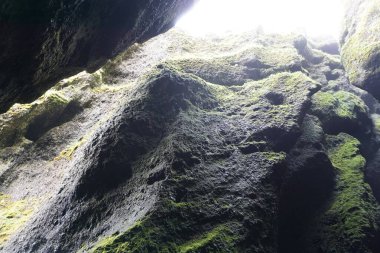 Rocks and sky in Raudfeldsgja Cave on Snaefellsnes Peninsula in Iceland