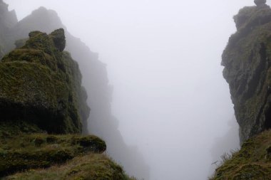 Rocks and fog at Raudfeldsgja Gorge on Snaefellsnes Peninsula in Iceland