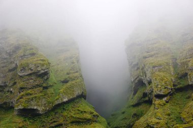 Rocks and fog at Raudfeldsgja Gorge on Snaefellsnes Peninsula in Iceland