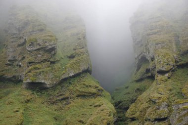 Rocks and fog at Raudfeldsgja Gorge on Snaefellsnes Peninsula in Iceland